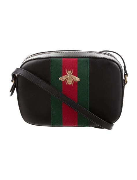 black gold bee and stars gucci back pock bag|Gucci bee bag.